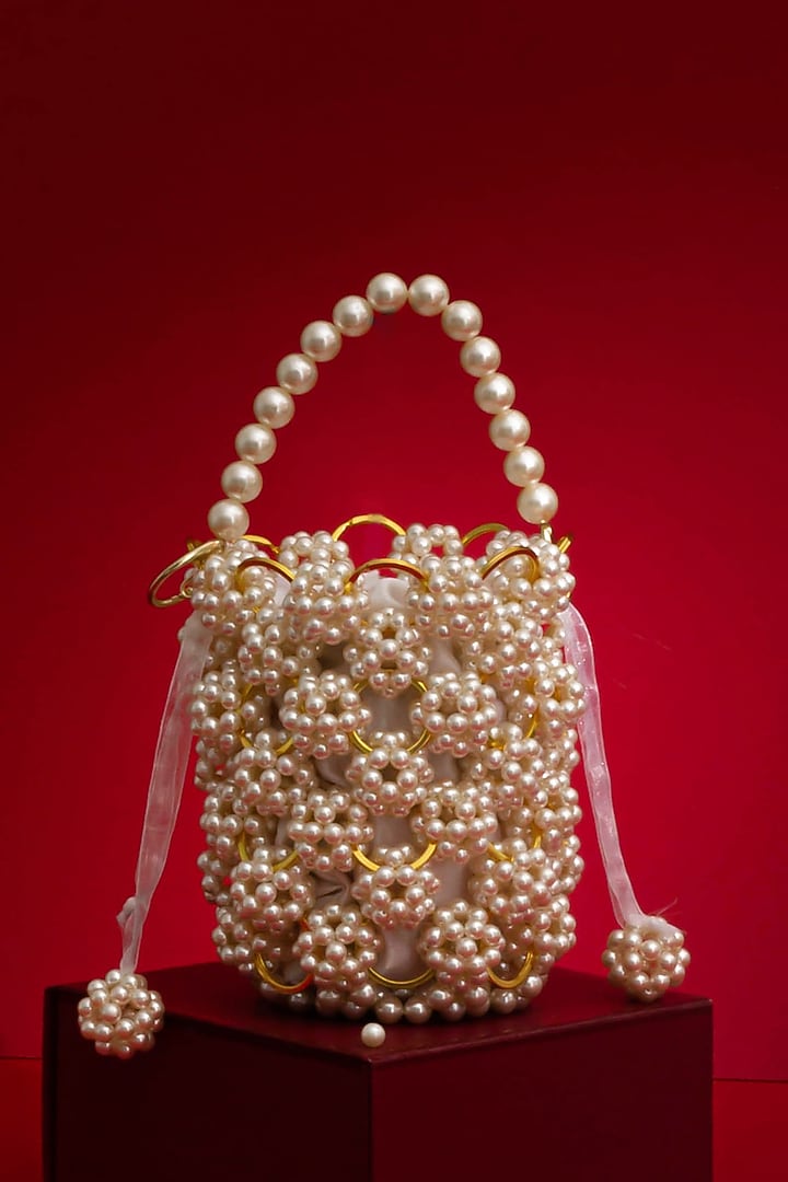 Off-White Hand-Selected Pearl Bucket Bag by AMYRA at Pernia's Pop Up Shop