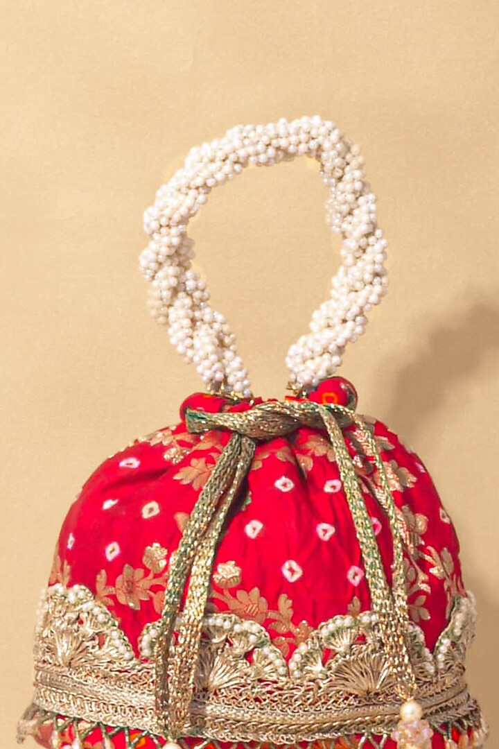 Red Bandhani Silk Bucket Bag by AMYRA at Pernia's Pop Up Shop
