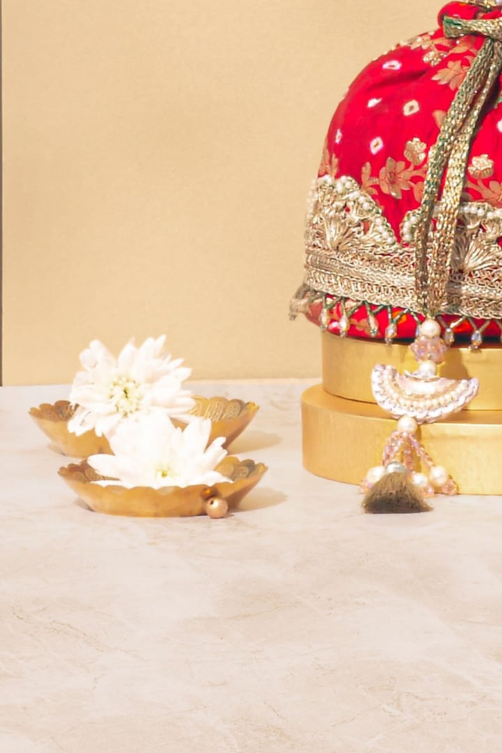 Red Bandhani Silk Bucket Bag by AMYRA at Pernia's Pop Up Shop
