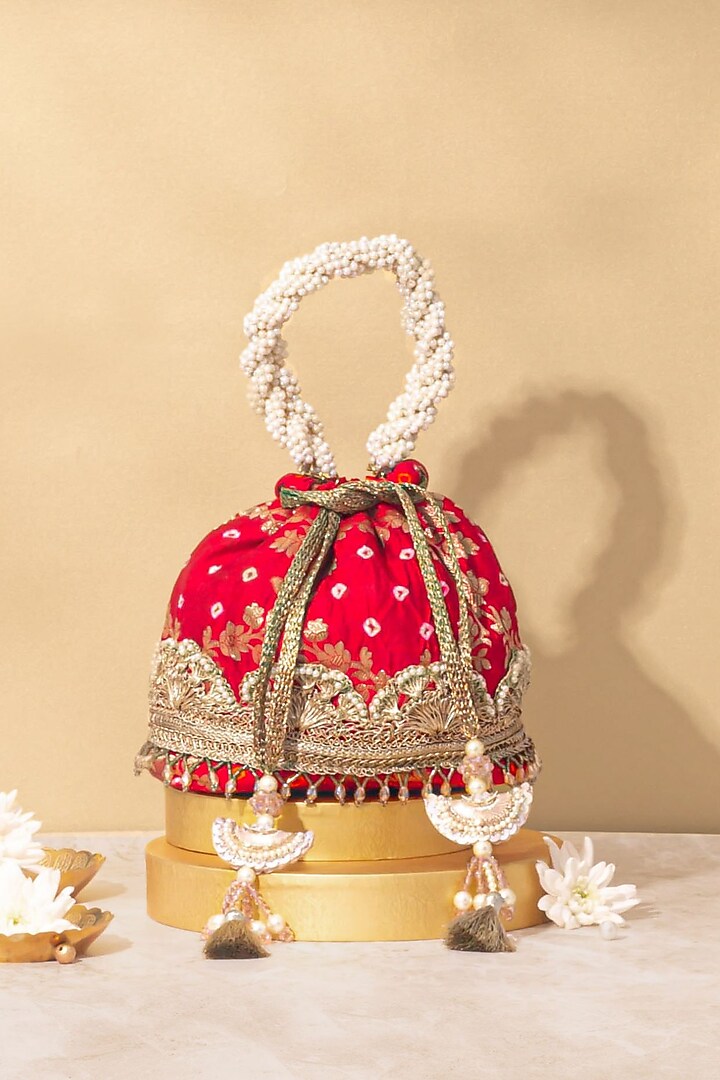 Red Bandhani Silk Bucket Bag by AMYRA at Pernia's Pop Up Shop