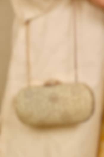 Light Gold Tissue Cutwork & Zari Thread Embroidered Clutch by AMYRA at Pernia's Pop Up Shop