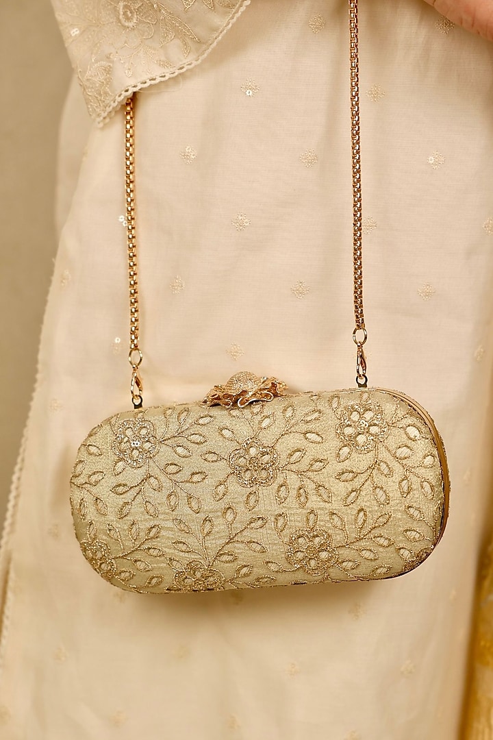 Light Gold Tissue Cutwork & Zari Thread Embroidered Clutch by AMYRA at Pernia's Pop Up Shop
