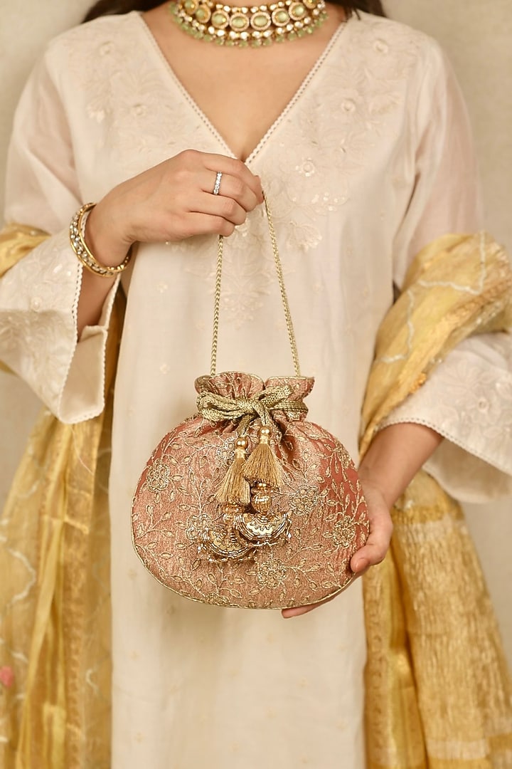 Copper Tissue Cutwork & Zari Thread Embroidered Potli by AMYRA at Pernia's Pop Up Shop