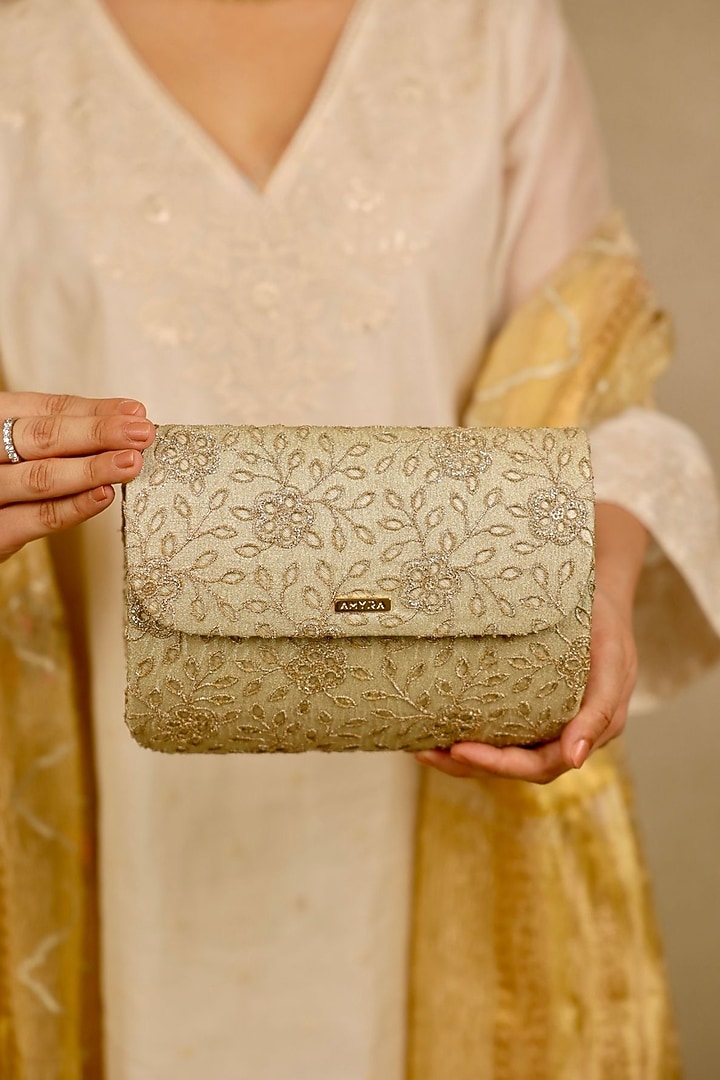 Light Gold Tissue Cutwork & Zari Thread Embroidered Flapover Bag by AMYRA at Pernia's Pop Up Shop