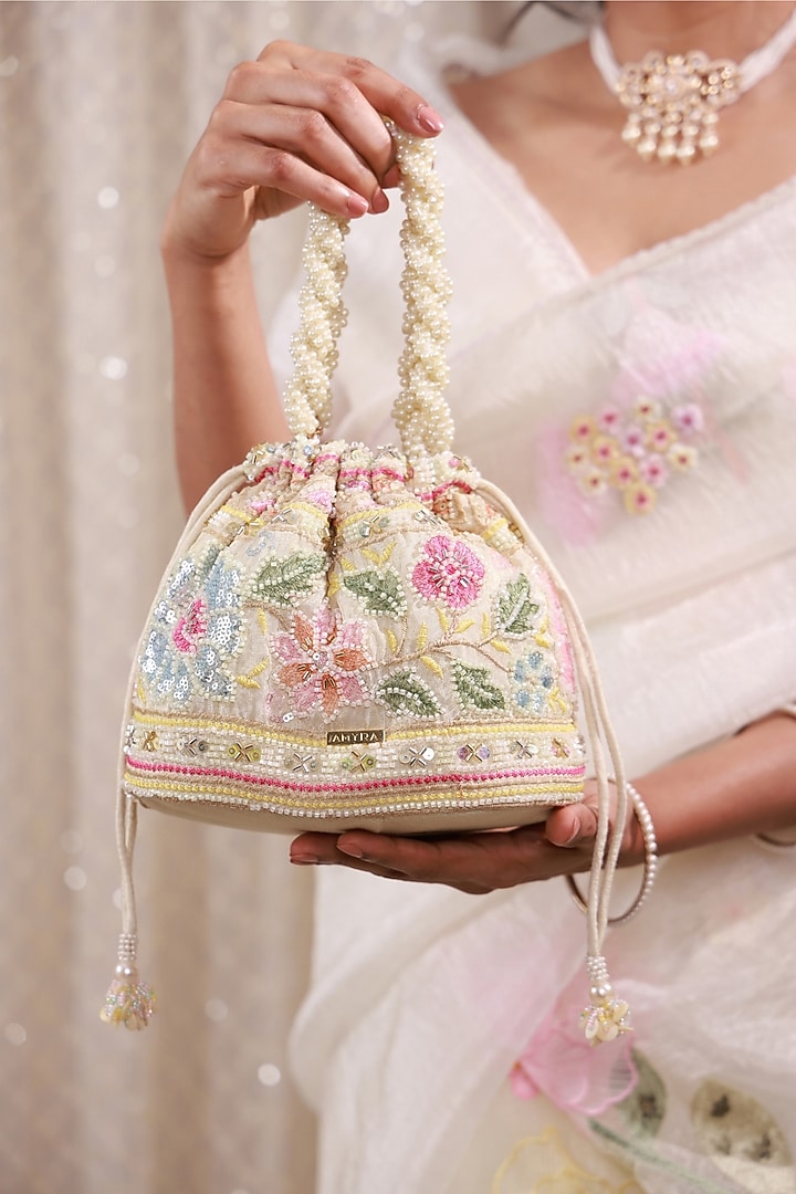 Multi-Colored Poly Silk Floral Embellished Handcrafted Potli Bag by AMYRA at Pernia's Pop Up Shop