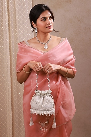 Silver Poly Silk Pearl Hand Embroidered Potli Bag by AMYRA