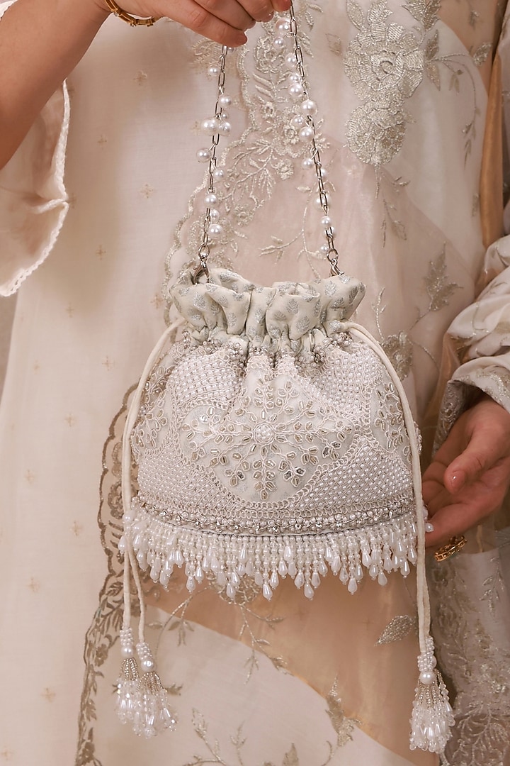 Silver Poly Silk Pearl Hand Embroidered Potli Bag by AMYRA at Pernia's Pop Up Shop