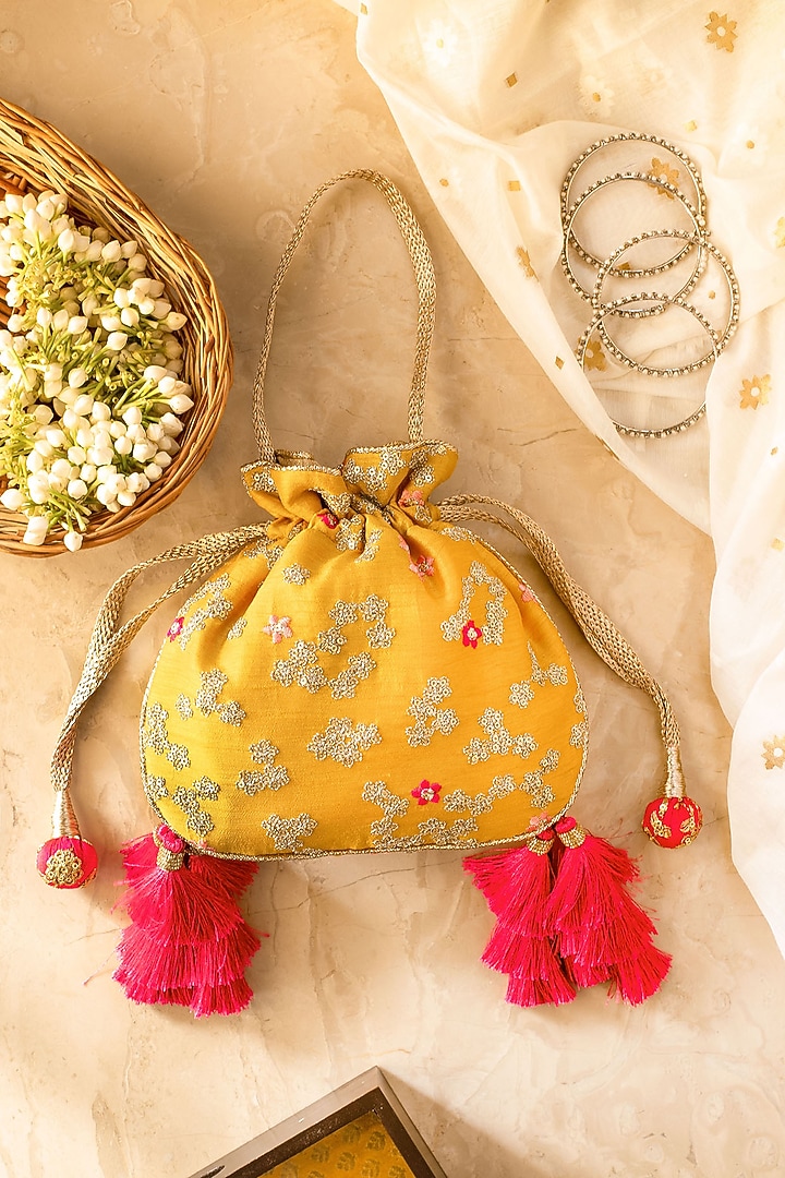 Yellow Tasseled Potli by AMYRA at Pernia's Pop Up Shop