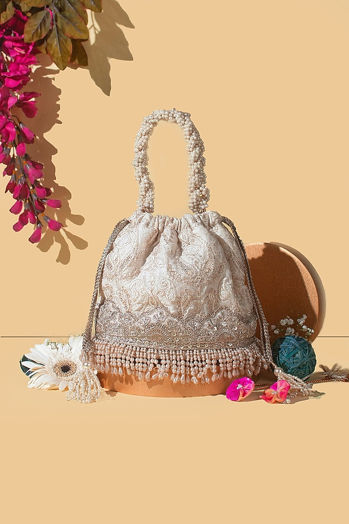 Off-White Poly Silk Embroidered Bucket Bag by AMYRA