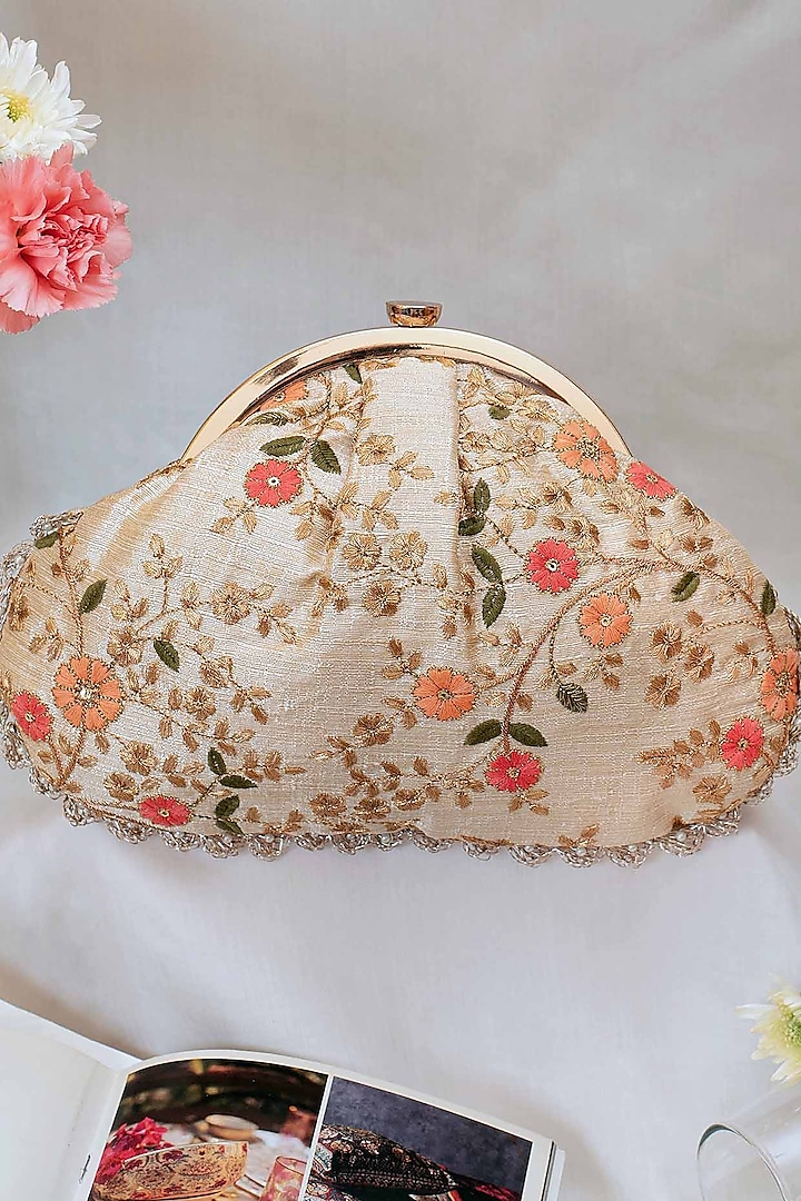Cream Poly Silk Embroidered Vintage Clutch by AMYRA