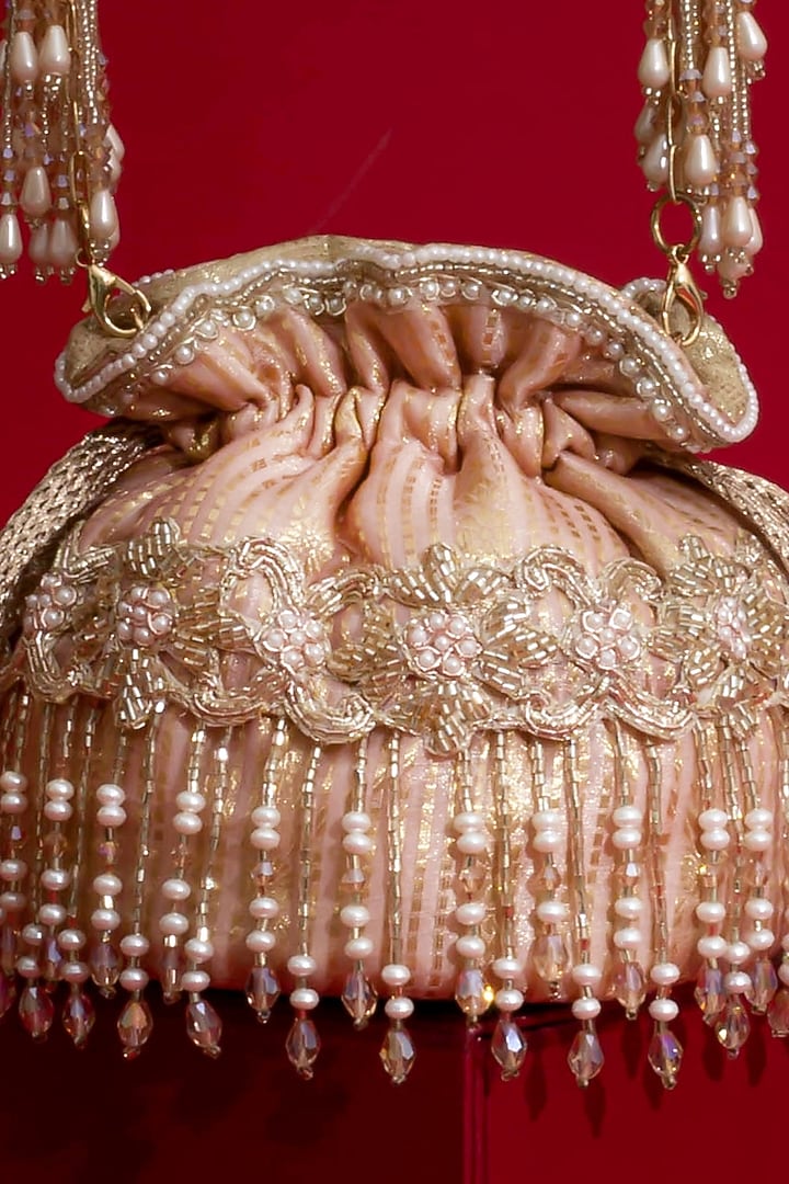Pink Silk Organza Cutdana Hand Embroidered Mini Potli by AMYRA at Pernia's Pop Up Shop