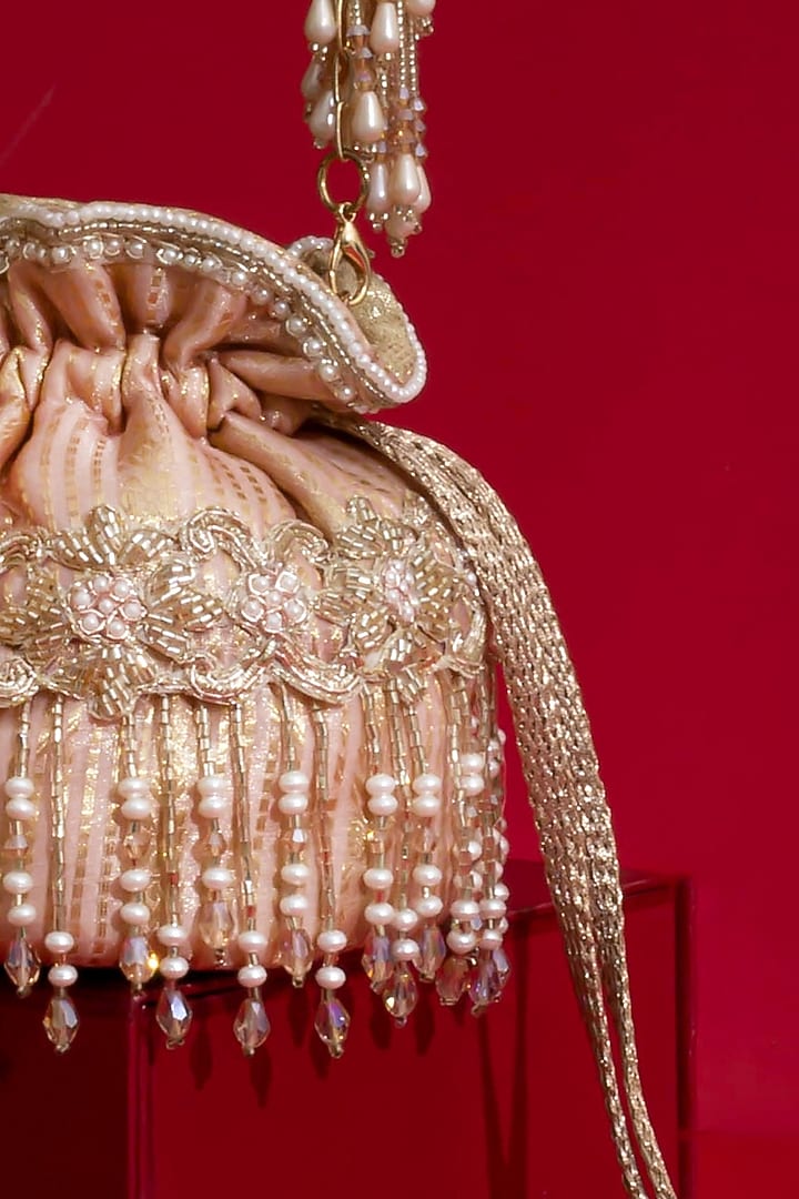 Pink Silk Organza Cutdana Hand Embroidered Mini Potli by AMYRA at Pernia's Pop Up Shop