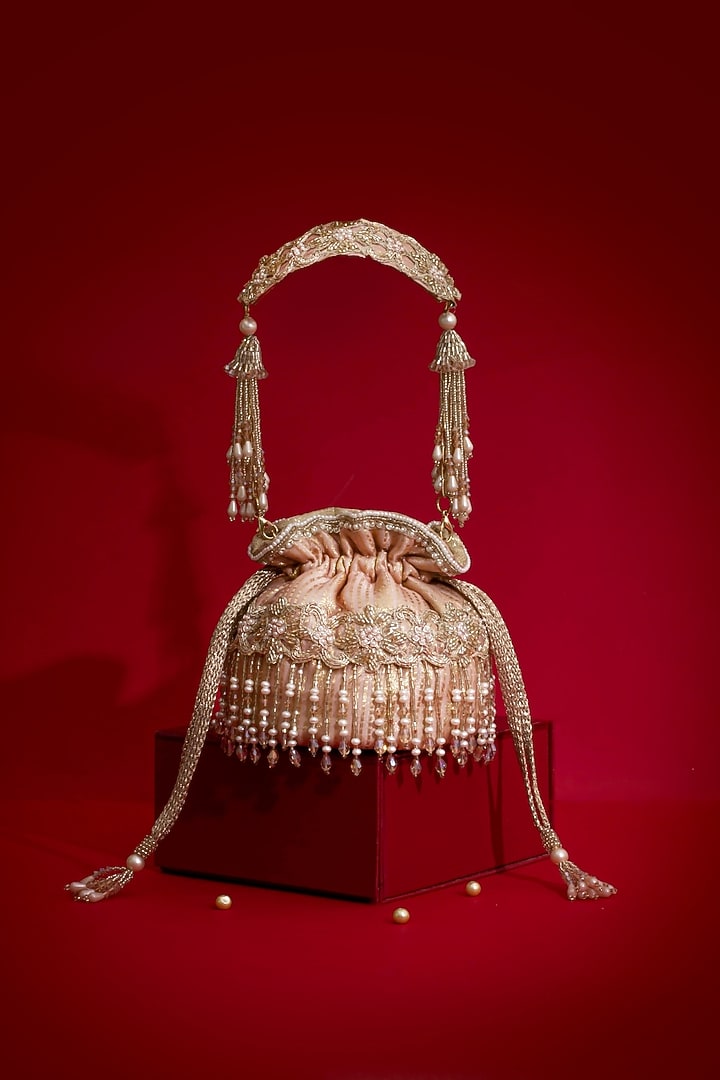 Pink Silk Organza Cutdana Hand Embroidered Mini Potli by AMYRA at Pernia's Pop Up Shop