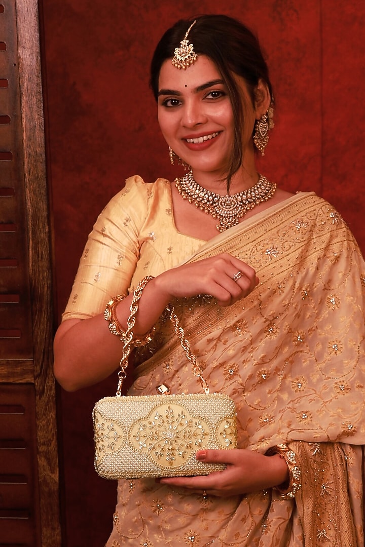 Beige Poly Silk Brocade Pearl Work Clutch by AMYRA at Pernia's Pop Up Shop