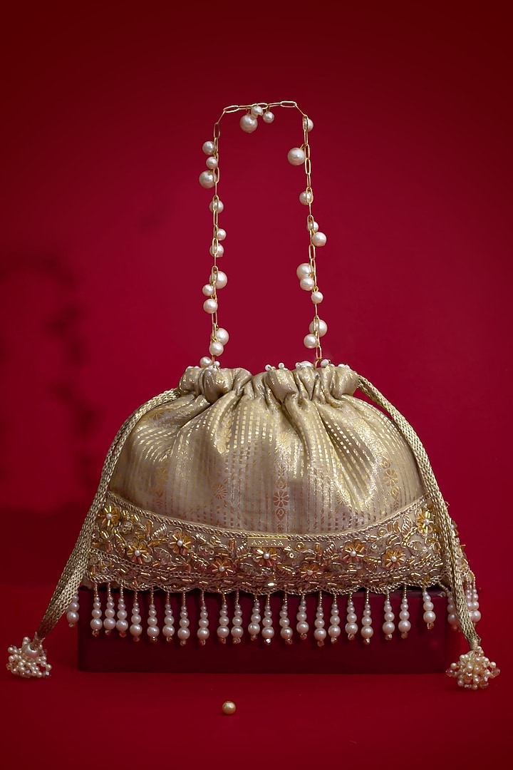 Grey Silk Organza Cutdana Lace Embroidered Potli by AMYRA at Pernia's Pop Up Shop