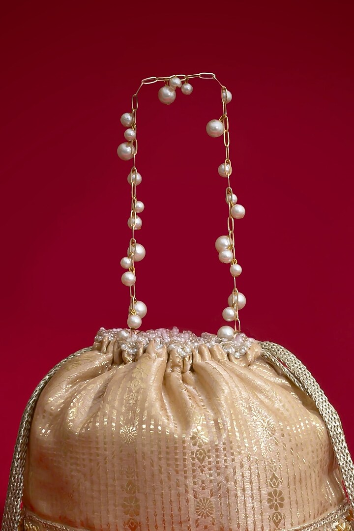 Beige Silk Organza Floral Lace Embroidered Bucket Bag by AMYRA at Pernia's Pop Up Shop