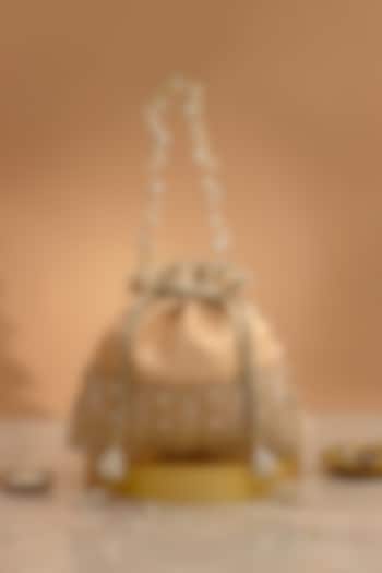 Peach Poly Silk Brocade Cutdana Law Embellished Potli by AMYRA at Pernia's Pop Up Shop