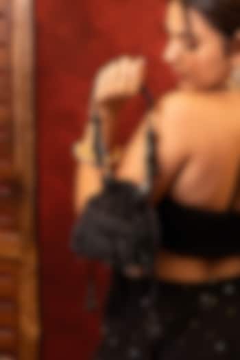 Black Poly Silk Floral Lace Embroidered Mini Potli by AMYRA at Pernia's Pop Up Shop