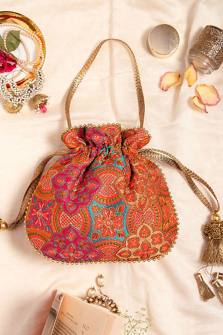 Red Embroidered Potli by AMYRA at Pernia's Pop Up Shop