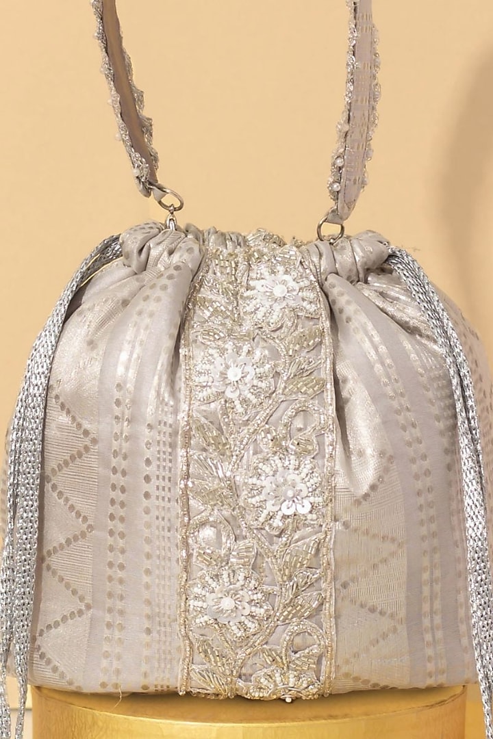 Silver Organza Embellished Bucket Bag by AMYRA at Pernia's Pop Up Shop