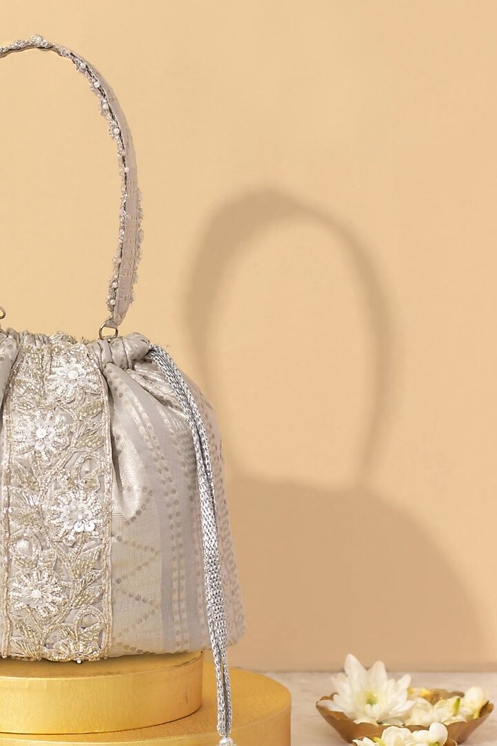 Silver Organza Embellished Bucket Bag by AMYRA at Pernia's Pop Up Shop