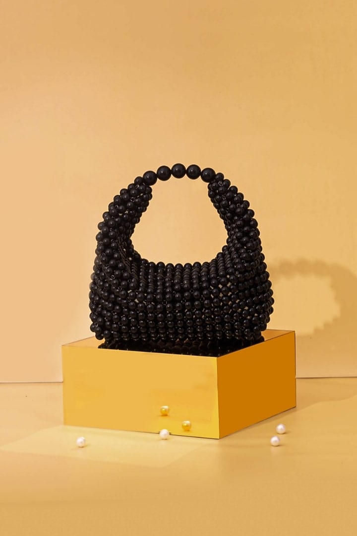 Black Hand-Selected Pearl Hand Bag by AMYRA at Pernia's Pop Up Shop