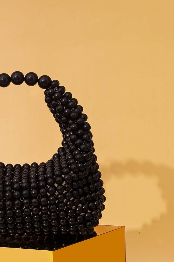 Black Hand-Selected Pearl Hand Bag by AMYRA at Pernia's Pop Up Shop