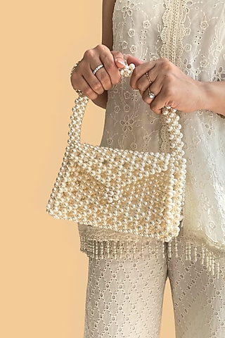 Off-White Pearl Triangle Handbag by AMYRA