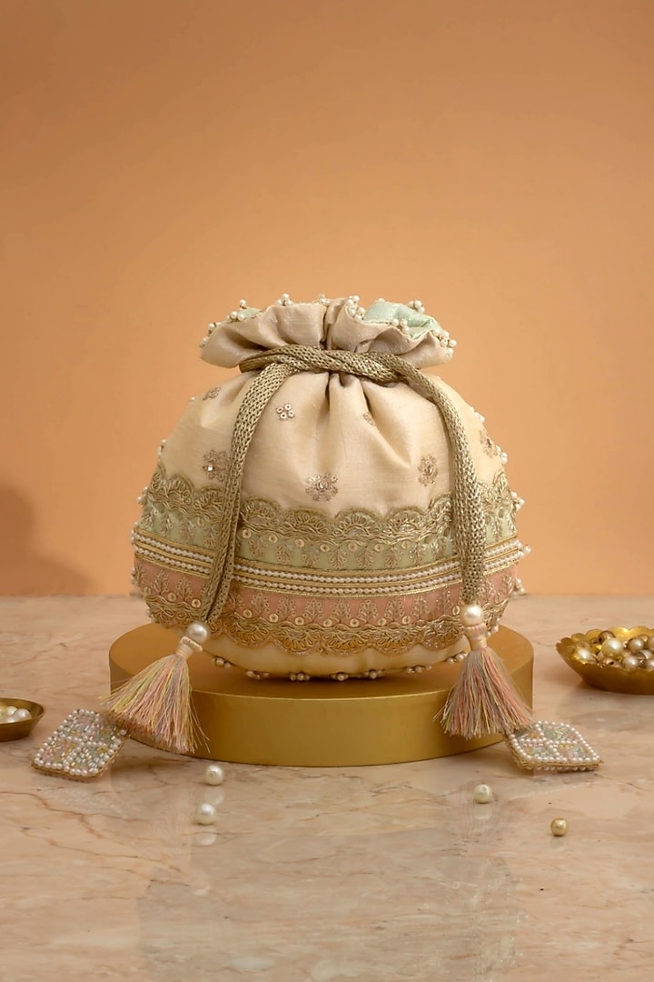 Mint & Pink Poly Silk Lace Embroidered Potli by AMYRA at Pernia's Pop Up Shop