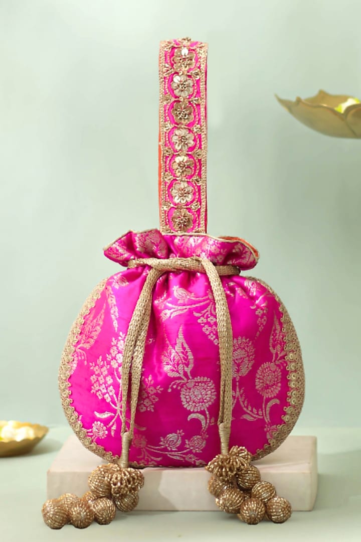 Pink Handwoven Raw Silk Sequins Embellished Potli by AMYRA at Pernia's Pop Up Shop