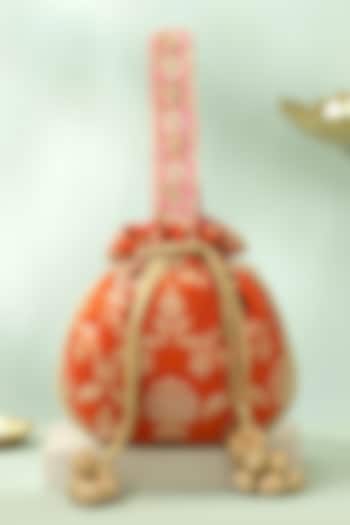 Rust Orange Handwoven Raw Silk Sequins Embellished Potli by AMYRA at Pernia's Pop Up Shop