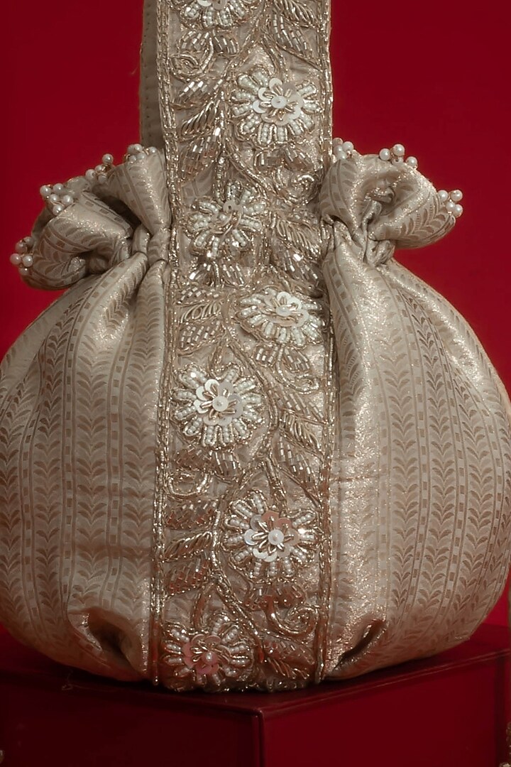 Champagne Organza Tissue Round-Shaped Potli by AMYRA at Pernia's Pop Up Shop