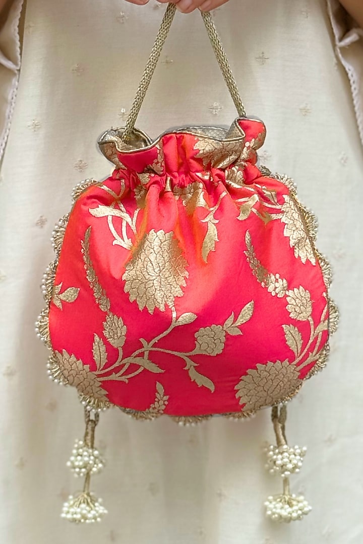 Coral Pink Pure Banarasi Silk Potli by AMYRA at Pernia's Pop Up Shop