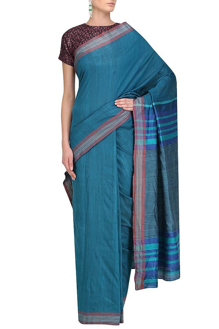 Blue handwoven saree and maroon blouse set available only at Pernia's Pop Up Shop.