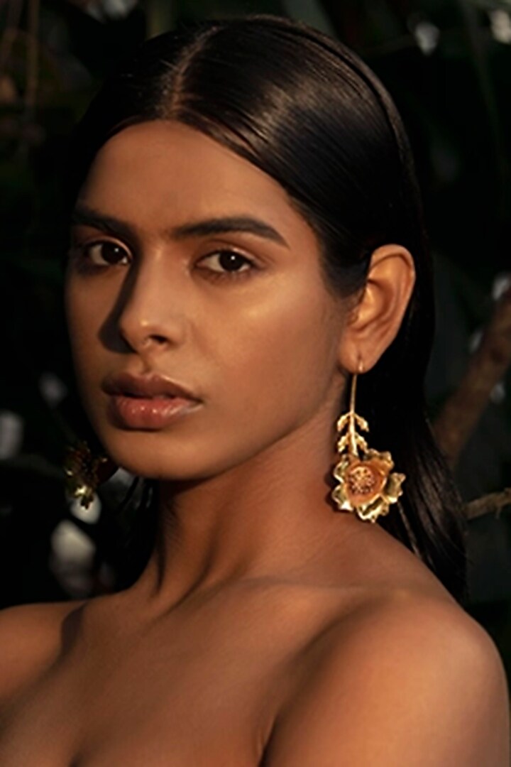 Gold Finish Floral Dangler Earrings by Ambar House at Pernia's Pop Up Shop