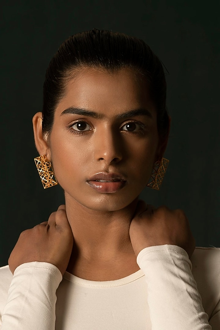 Gold Finish Brass Dangler Earrings by Ambar House at Pernia's Pop Up Shop