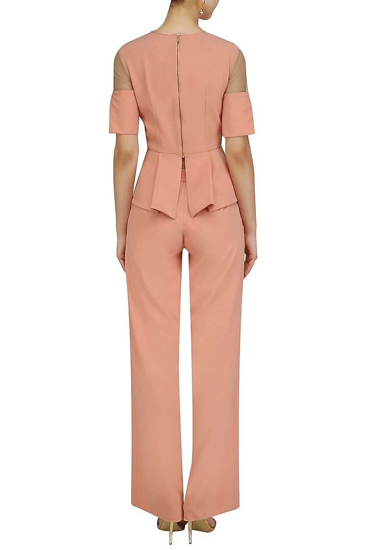 Salmon peplum top available only at Pernia's Pop Up Shop.