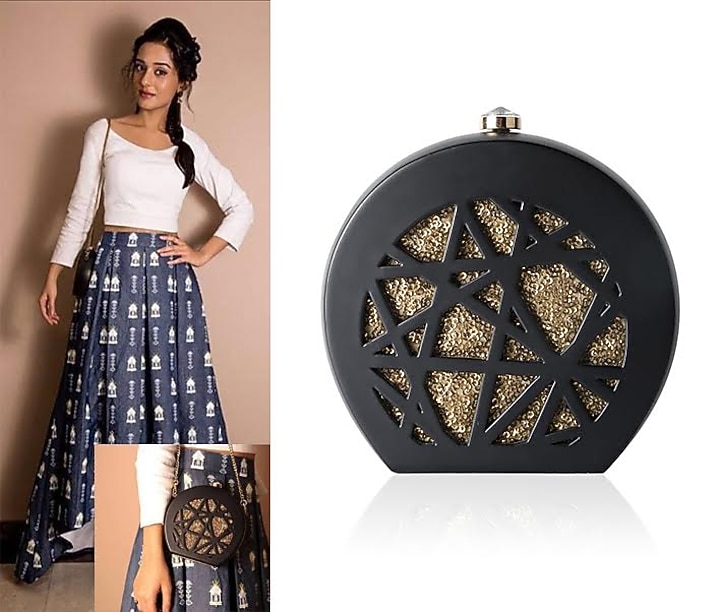 Duet luxury presents Black round box clutch with gold sequins insert available only at Pernia's Pop Up Shop.