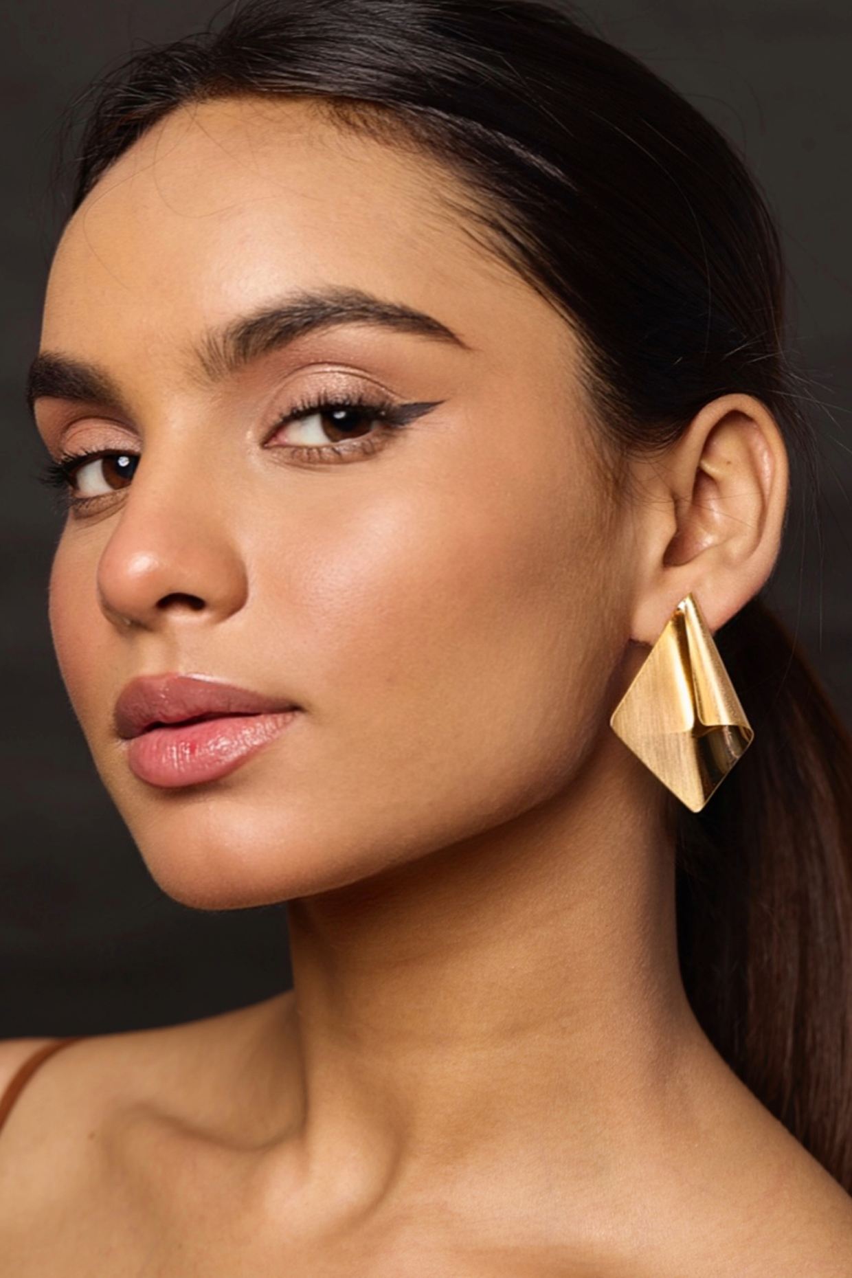 Gold Finish Statement Dangler Earrings by Amreli Jaipur at Pernia's Pop Up Shop