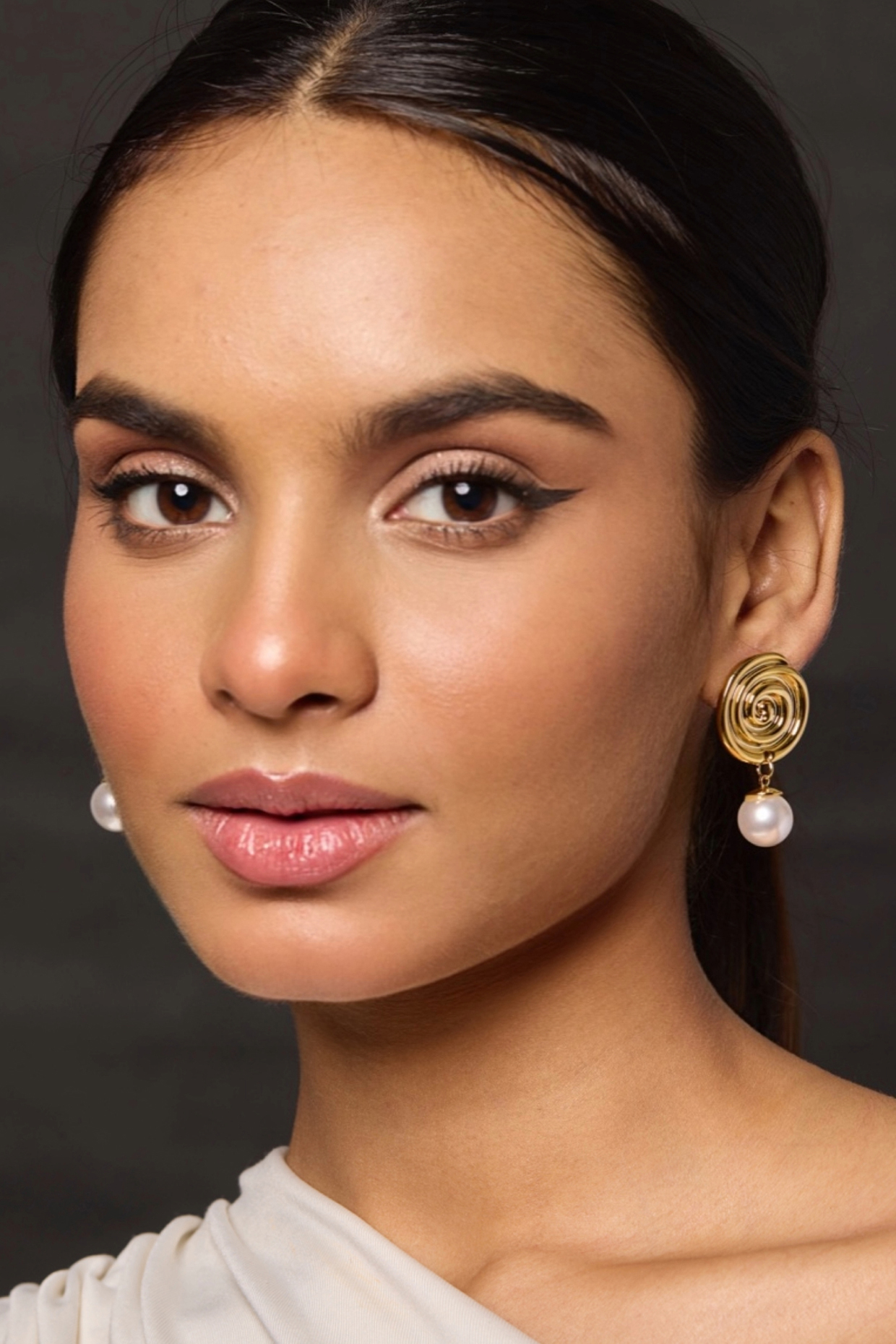 Gold Finish Statement Stud Earrings by Amreli Jaipur at Pernia's Pop Up Shop