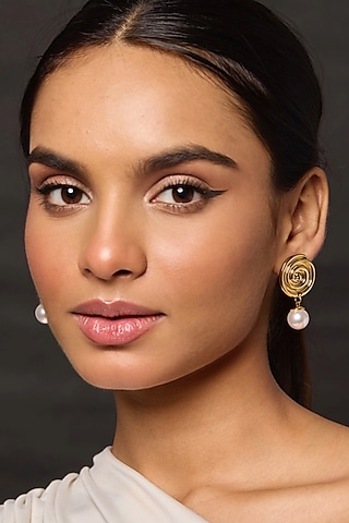Gold Finish Statement Stud Earrings by Amreli Jaipur