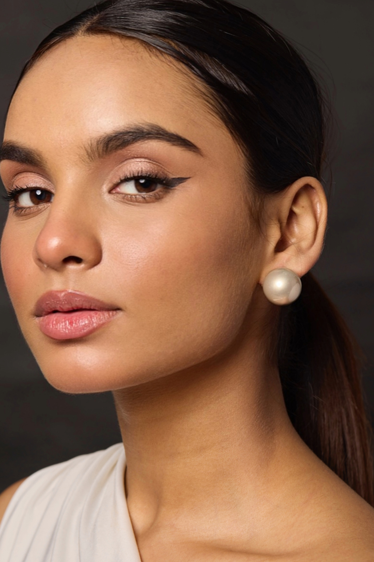 Gold Finish Statement Stud Earrings by Amreli Jaipur at Pernia's Pop Up Shop
