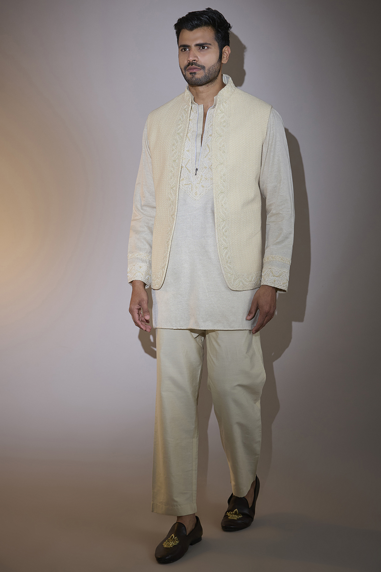 Cream Crochet Hand Embroidered Bundi Jacket Set by AMIT ARORA