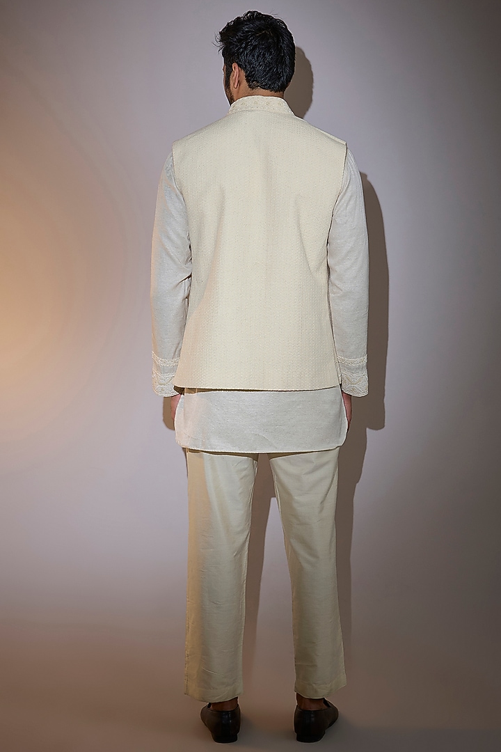 Cream Crochet Hand Embroidered Bundi Jacket Set by AMIT ARORA at Pernia's Pop Up Shop