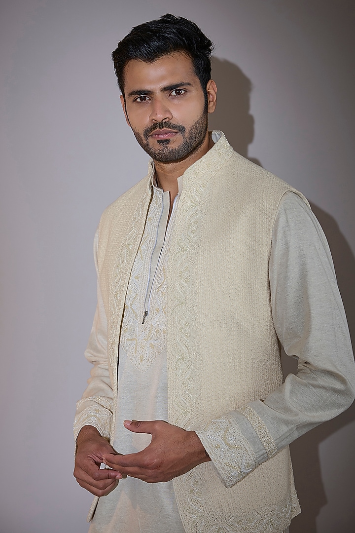 Cream Crochet Hand Embroidered Bundi Jacket Set by AMIT ARORA at Pernia's Pop Up Shop