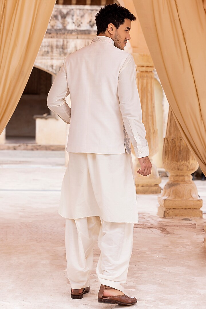Cream Raw Silk Hand Embroidered Bundi Jacket Set by AMIT ARORA at Pernia's Pop Up Shop