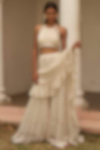 Ivory Metallic Yarn Pre-Draped Ruffled Sharara Saree Set by AMRTA By Guneet Kondal at Pernia's Pop Up Shop