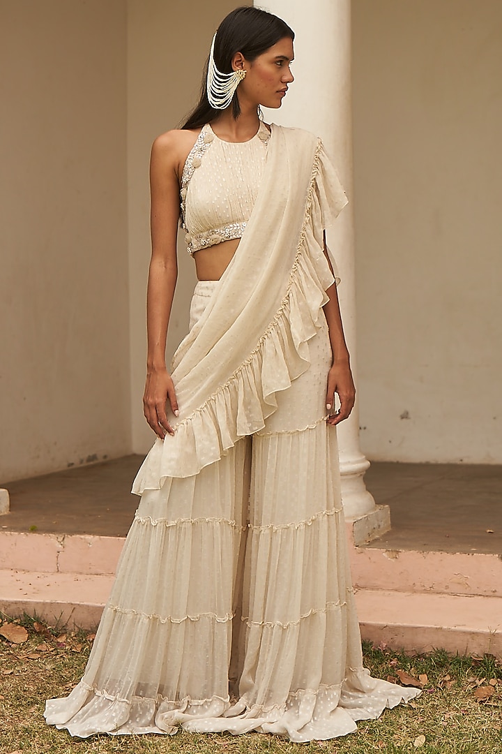 Ivory Metallic Yarn Pre-Draped Ruffled Sharara Party Wear Saree Set by AMRTA By Guneet Kondal at Pernia's Pop Up Shop