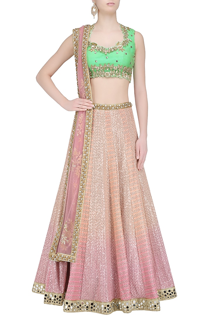 Pink shaded sequins and thread work lehenga with mint green blouse available only at Pernia's Pop Up Shop.