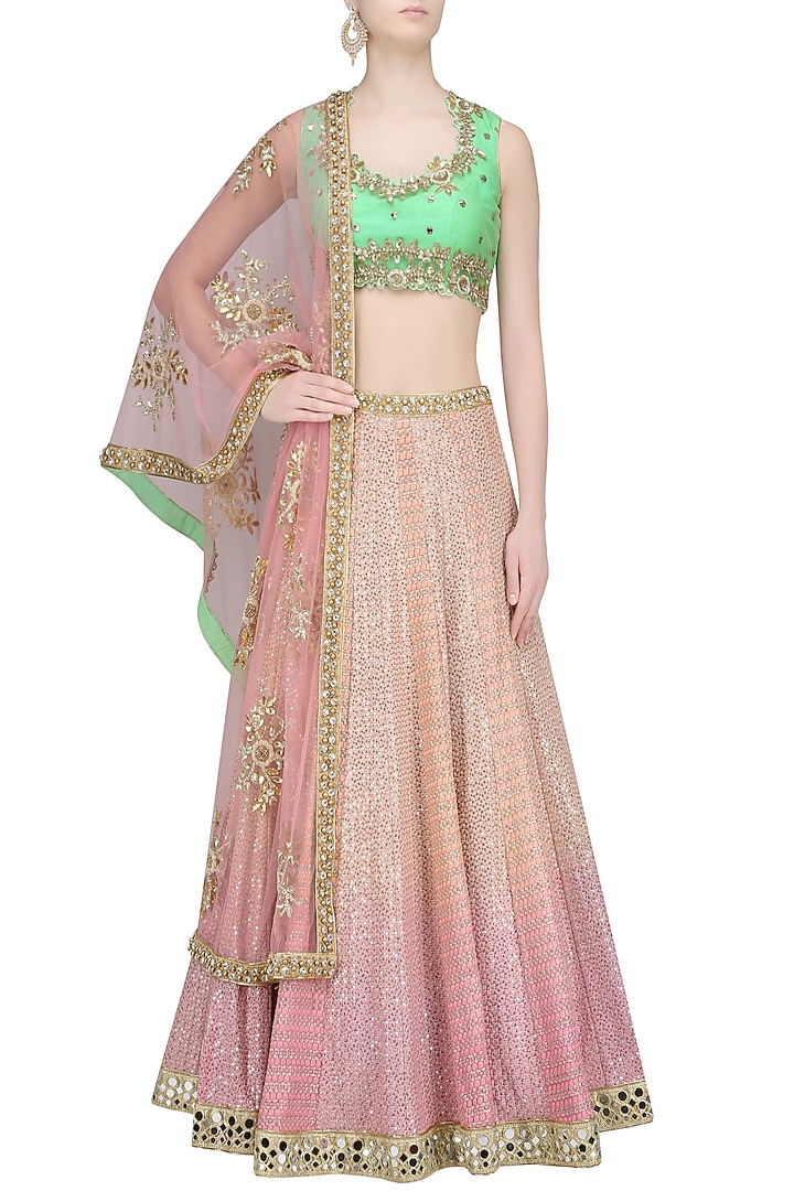 Pink shaded sequins and thread work lehenga with mint green blouse available only at Pernia's Pop Up Shop.